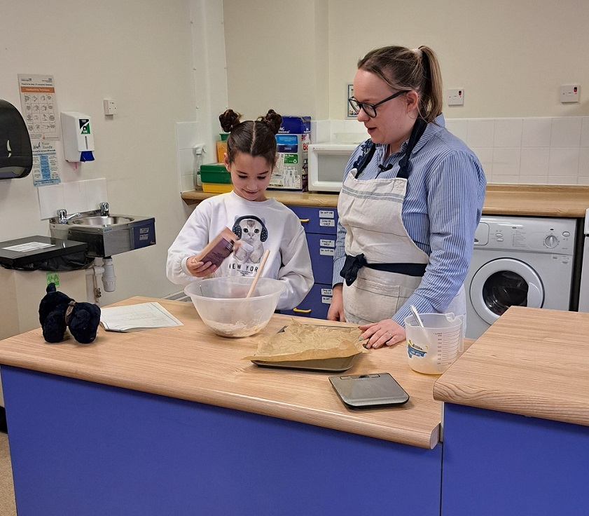 Picture of Florence and Becky in the baking class PR image